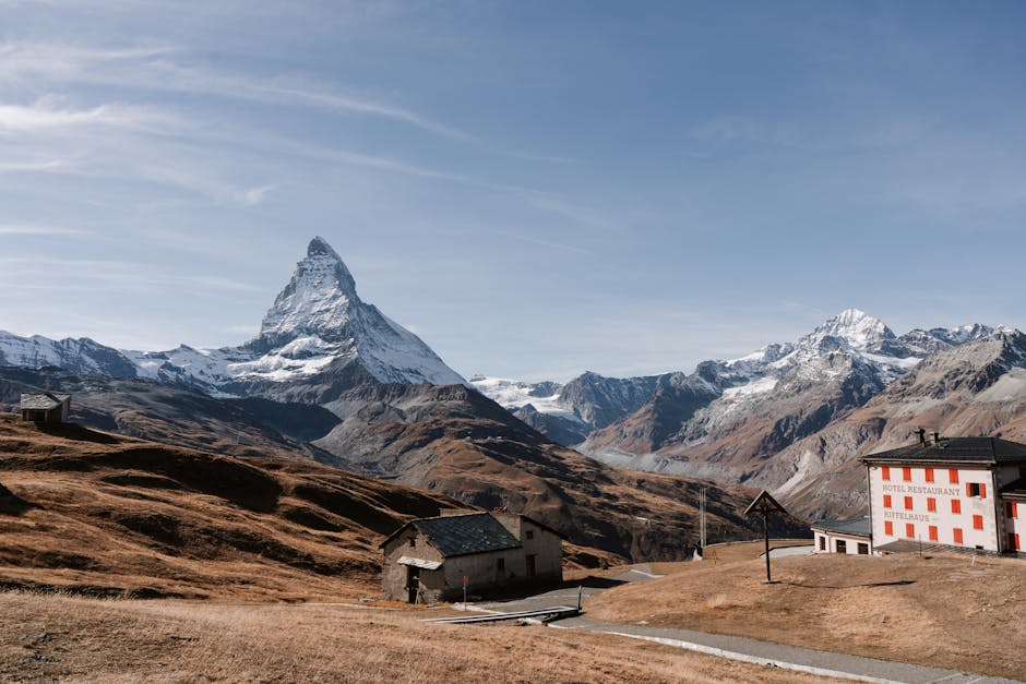 Beautiful view of the Matterhorn surrounded by rustic houses in Zermatt, Switzerland.